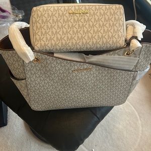 Michael Kors Vanilla large jet set travel handbag and matching wallet